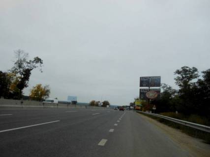 Білборд, Бігборд (Борд)  A у Києві с. Віта-Поштова, траса М-05 Київ-Одеса, км 17+305 право, через 450м після АЗС КЛО, за 400м до заїзду на АЗС WOG, верх Фото 1