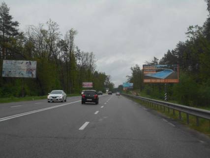 Білборд, Бігборд (Борд)  A у Києві, 6х3  Київ-Романівка-Ірпінь, км 2+650 від Олега Мудрака вул. (Генерала Наумова), напрямок в Київ Фото 1