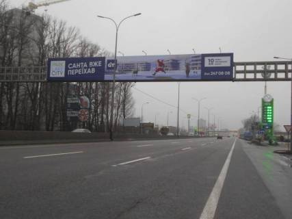 Билборд B в Киеве м. Київ, проспект Академіка Глушкова, траса М-05 Київ-Одеса, км 13+550 ліво, виїзд з Києва, навпроти АЗС UPG, за 160м до АЗС ОККО, за 320м до Нової Лінії та магазину АТБ, верх фото 1