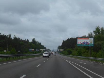 Білборд, Бігборд (Борд)  A у Капітанівке, 6х3  с. Капітанівка, траса М-06 "Київ-Чоп" (Житомир), км 23+100 право, за с. Стоянка, за 620м до повороту на Базу "Снайпер" Фото 1