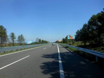 Білборд, Бігборд (Борд)  A на трасах Київської області, 6х3  Дніпровське шосе, траса Н-01 "Київ-Знам'янка", км 31+150 ліво, елітна приватна забудова, біля с. Великі Дмитровичі Фото 1