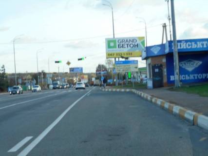 Билборд A в Гостомеле, 6х3  м. Гостомель-м. Ірпінь, вул. Шевченка-вул. Свято- Покровська (навпроти №20-А), траса М-07, км 23+650 ліво, перед Ірпінським кільцем, біля Сіті Маркету, зупинка фото 1