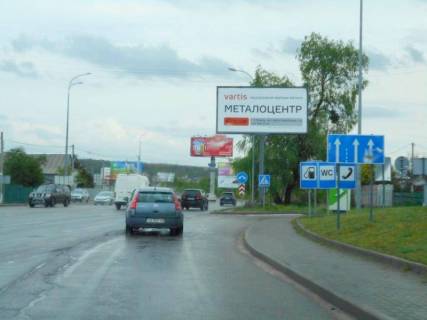 Билборд A в Гостомеле, 6х3  м. Гостомель-м. Ірпінь, вул. Шевченка-вул. Свято- Покровська (навпроти №10), перетин з вул. Гайдамацька, траса М-07, км 23+550 ліво, біля АЗК ОККО, Сіті Маркет фото 1