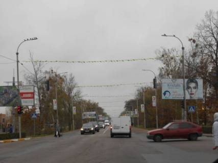 Білборд, Бігборд (Борд)  A у Бучі м. Буча, траса М-07, км 29+300 право, вул. Нове шосе, 22, біля ресторану "Мі Амор", на світлофорі, ЖК "Гранд Бурже" Фото 1