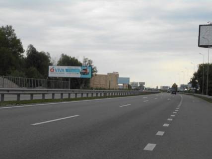 Билборд B в Ходосовке, 12х3  Дніпровське шосе, траса Н-01 "Київ-Знам'янка", км 23+950 ліво, через 300м після повороту на с. Ходосівку та АЗС UPG, навпроти ТЦ "МегаМаркет", правий фото 1