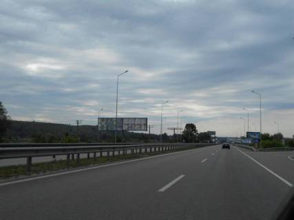 Billboard B in Kiev roads, 12х3  Dniprovs'ke sose, trasa N-01 "Kiiv-Znam'anka", km 25+120 pravo, rozv'azka na s. Krenici, pravij Photo 1