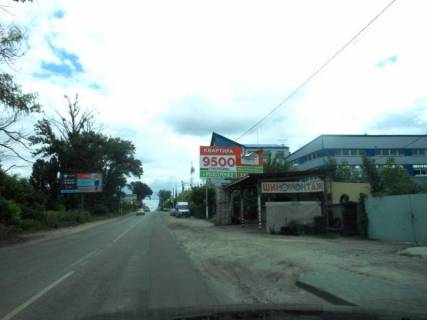 Билборд A в Киеве, 6х3  с. Крюківщина, вул. Одеська, за 100м до будівельного маркету "Домосвіт", за 500м до ЖК "Молодіжне містечко", за 950м до ЖК "Оранж Парк" та розвилки з вул. Прикордонна, напрямок в с. Гатне фото 1