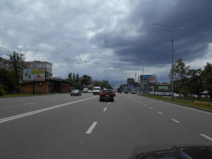 Билборд A в Бровары м. Бровари, вул. Київська, 241 (навпроти будинку 296), за 125м до перехрестя з Героїв України вул. (кол. Гагаріна) та вул. В'ячеслава Чорновола, біля магазину Сільпо та навпроти автобусної зупинки фото 1