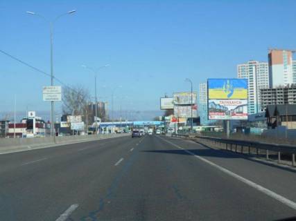 Білборд, Бігборд (Борд)  A у Гатному, 6х3  с. Чабани, траса М-05 Київ-Одеса, км 14+625 ліво, за 560м до Нової Лінії та магазину АТБ, через 320м після заїзду у МегаМаркет Гатне, через 465м після повороту на Гатне, Крюківщину, Вишневе та ЖК "Оптимісто", верх Фото 2