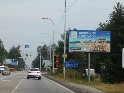 Билборд A в с. Козине Конча-Заспа, траса Р-02, км 30+150 ліво, перед  АЗС "БРСМ", перед супермаркетом "FAVORE" фото 1