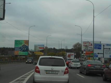 Билборд B в Ирпене м. Ірпінь, траса М-07, км 23+400 ліво, вул. Свято-Покровська, 2а, за мостом через р. Ірпінка, навпроти офісу ЖК "Гостомель Резіденс", за 350м до розвилки Ірпінь-Буча-Гостомель, за 150м до АЗС ОККО, верх фото 1
