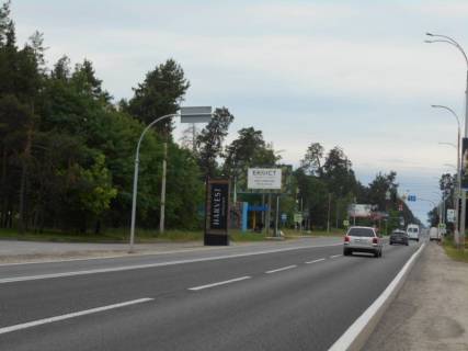 Билборд B в Козине, 6х3  Конча-Заспа, траса Р-01, км 29+930 право, автобусна зупинка "Козин-2", за 110м до повороту на вул. Партизанська, за 190м до супермаркету "FAVORE" фото 1
