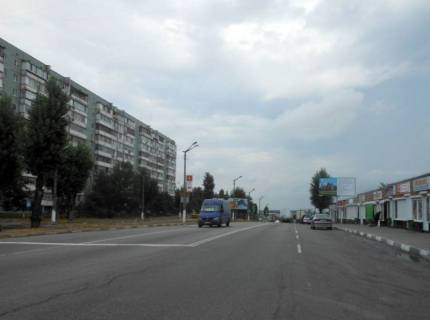 Білборд, Бігборд (Борд)  A у Обухові м. Обухів, вул. Київська,168, навпроти ринку та житлового комплексу "Нектарний"; за поворотом до супермаркета "Велика кишеня" Фото 1