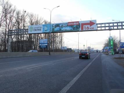 Билборд B в Киеве м. Київ, проспект Академіка Глушкова, траса М-05 Київ-Одеса, км 13+550 ліво, виїзд з Києва, навпроти АЗС UPG, за 160м до АЗС ОККО, за 320м до Нової Лінії та магазину АТБ, низ фото 1
