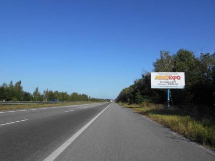 Билборд A в Киеве траса М-06 Київ-Чоп (Житомир), км 42+350 ліво, 1км після повороту на Мотижин, 1км до повороту на котеджне містечко "Німецька слобода" фото 1