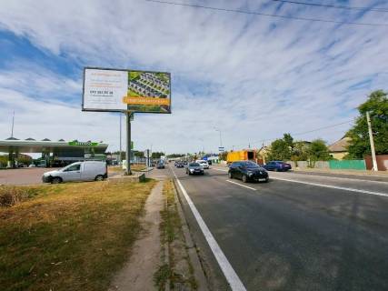 Билборд B в Ирпене, 6х3  м. Ірпінь - смт. Гостомель, км 23+550 ліво, перед Сіті Маркетом, перед АЗК ОККО фото 1