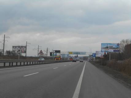 Билборд A в Киеве шосе Дніпровське (шосе Дніпропетровське), траса Н-01 "Київ-Знам'янка", км 21+920 право, територія під котеджну забудову фото 1
