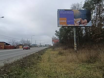 Билборд A в Ворзеле, 6х3  траса М-07 "Київ-Ковель", км 31+050 право, навпроти АЗС Лукойл, через 100м після повороту на смт. Ворзель фото 1