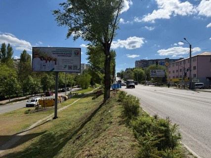 Билборд B в Обухове, 6х3  м. Обухів, вул. Київська, 144, біля дитячого майданчику "Рошен" фото 1
