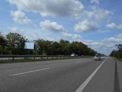 Билборд B в Киеве траса М-06 Київ-Чоп (Житомир), км 42+850 ліво, 650м до повороту на Мотижин, поворот на котеджне містечко "Німецька слобода" фото 1
