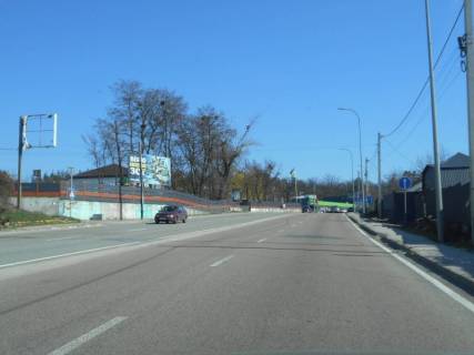Билборд B в Гостомеле, 6х3  смт. Гостомель, траса М-07 "Київ-Ковель", км 22+800 право, вул. Кулішова, 44, перед поворотом на с. Горенка,  за 100м до магазину "Фора" фото 1