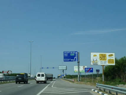 Billboard A in With. Mila, 6х3  с. Мила, траса М-06 "Київ-Чоп" (Житомир), км 26+800 право, біля садового центру, через 550м після магазину "Фора", за 625м до АЗС GLUSCO Photo 1