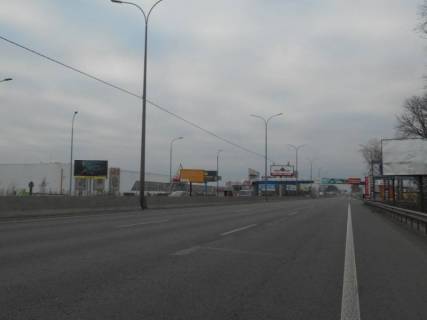 Билборд B в Киеве м. Київ, проспект Академіка Глушкова, траса М-05 Київ-Одеса, км 13+800 ліво, заїзд на АЗС ОККО, за 70м до Нової Лінії та магазину АТБ фото 1