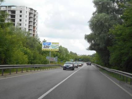 Билборд B в Обухове, 6х3  Дніпровське шосе, траса Н-01 "Київ-Знам'янка", км 44+200 право, через 200м після готелю "Зелена гора", через 400м після АЗС SOCAR, через 500м після повороту на вул. Загребля фото 1