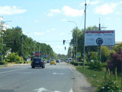 Билборд A в Буче, 6х3  м. Буча, траса М-07 "Київ-Ковель", км 29+300 ліво, вул. Нове шосе, перехрестя з бульваром Богдана Хмельницького, на світлофорі, ЖК "Гранд Бурже" фото 1