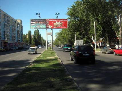 Билборд A в Одессе, 3х6  пр-т Ак.Глушка,17 - "Єльдорадо", з площи (ліворуч) фото 1