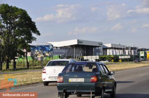 Билборд  в Днепр (Днепропетровск) Донецьке шосе, за м. Підгороднє,  виїзд з міста, км 227+250, в сторону Новомосковська,  район SunRay фото 1