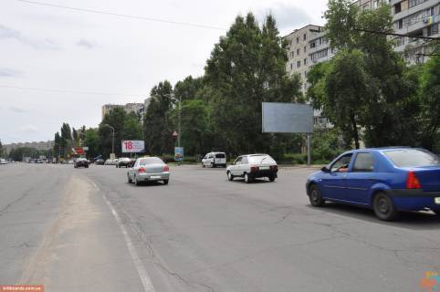 Билборд  в Днепр (Днепропетровск) пр-т Героев, д. 12, "китайская стена", из центра фото 1